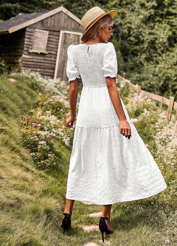 Vestido midi con textura fruncida