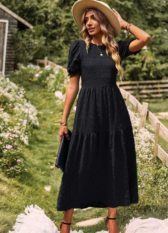 Vestido midi con textura fruncida